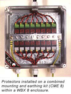 Protectors installed on a combined mounting and earthing kit (CME 8) within a WBX 8 enclosure.