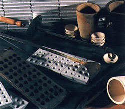Selection of crucibles and charge loader