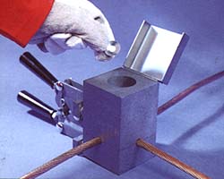 place metal retaining disc in the bottom of the mould crucible