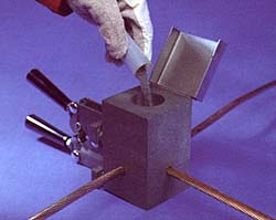 pour the powder into the crucible